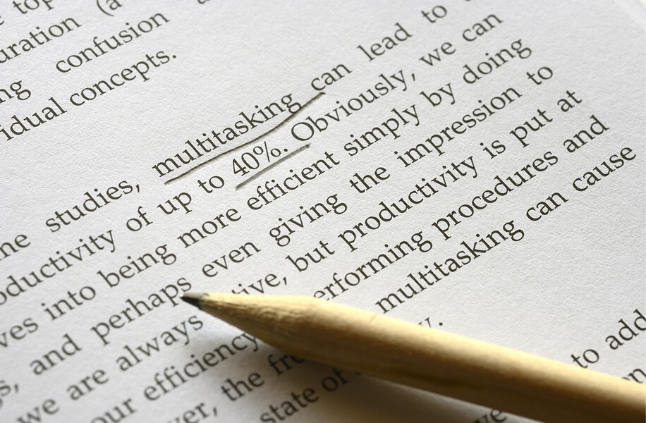 Professional book editing and proofreading services with a marked manuscript and editing pencil.