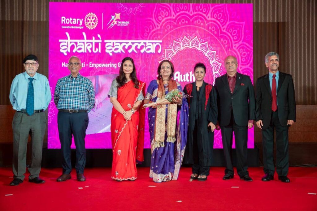 SOMA BOSE WITH DISTRICT GOVERNOR ROTARY INTERNATIONAL AFTER RECEIVING SHAKTI SAMMAN AWARD