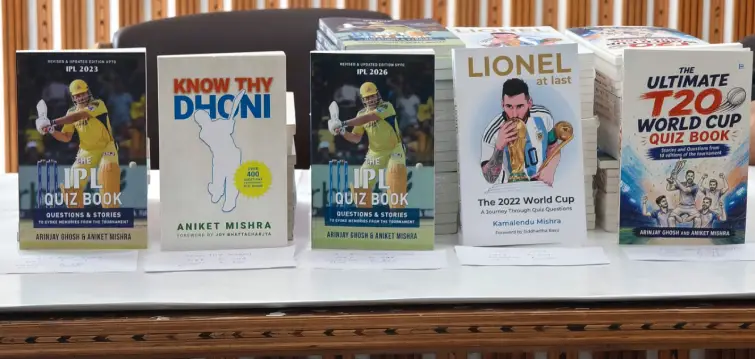 Blue Pencil sports quiz books displayed at Barefoot Sports Quiz Festival 2026